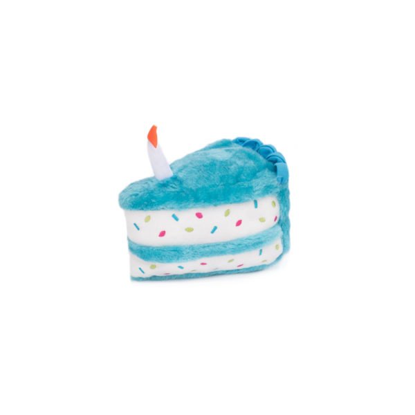 Plush toy shaped like a blue birthday cake with a candle on a white background
