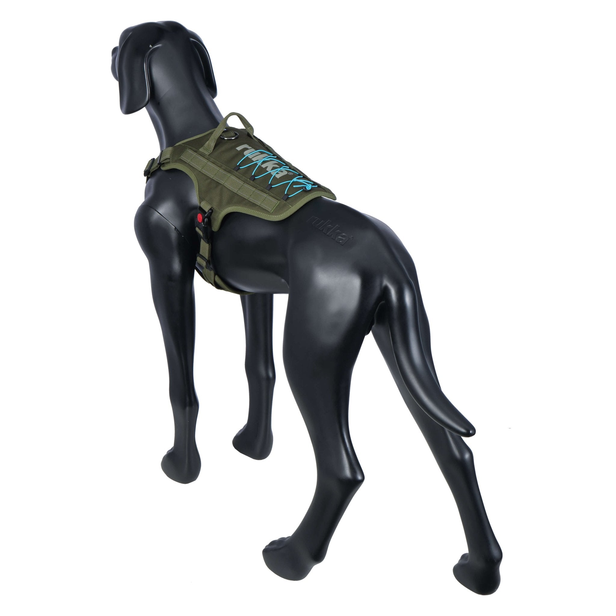 Green dog harness on a black mannequin dog against a white background