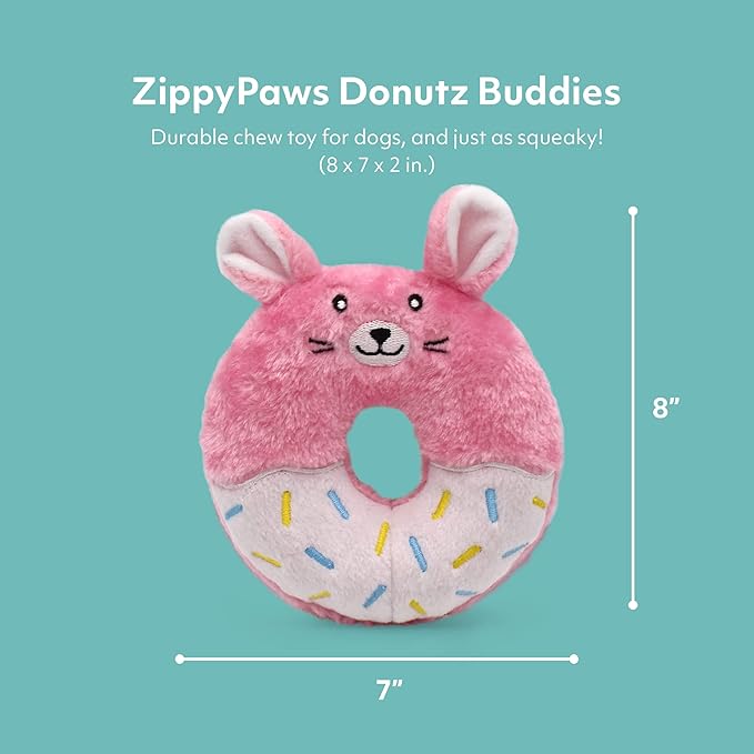 Pink donut-shaped dog toy with mouse design on a teal background, labeled &