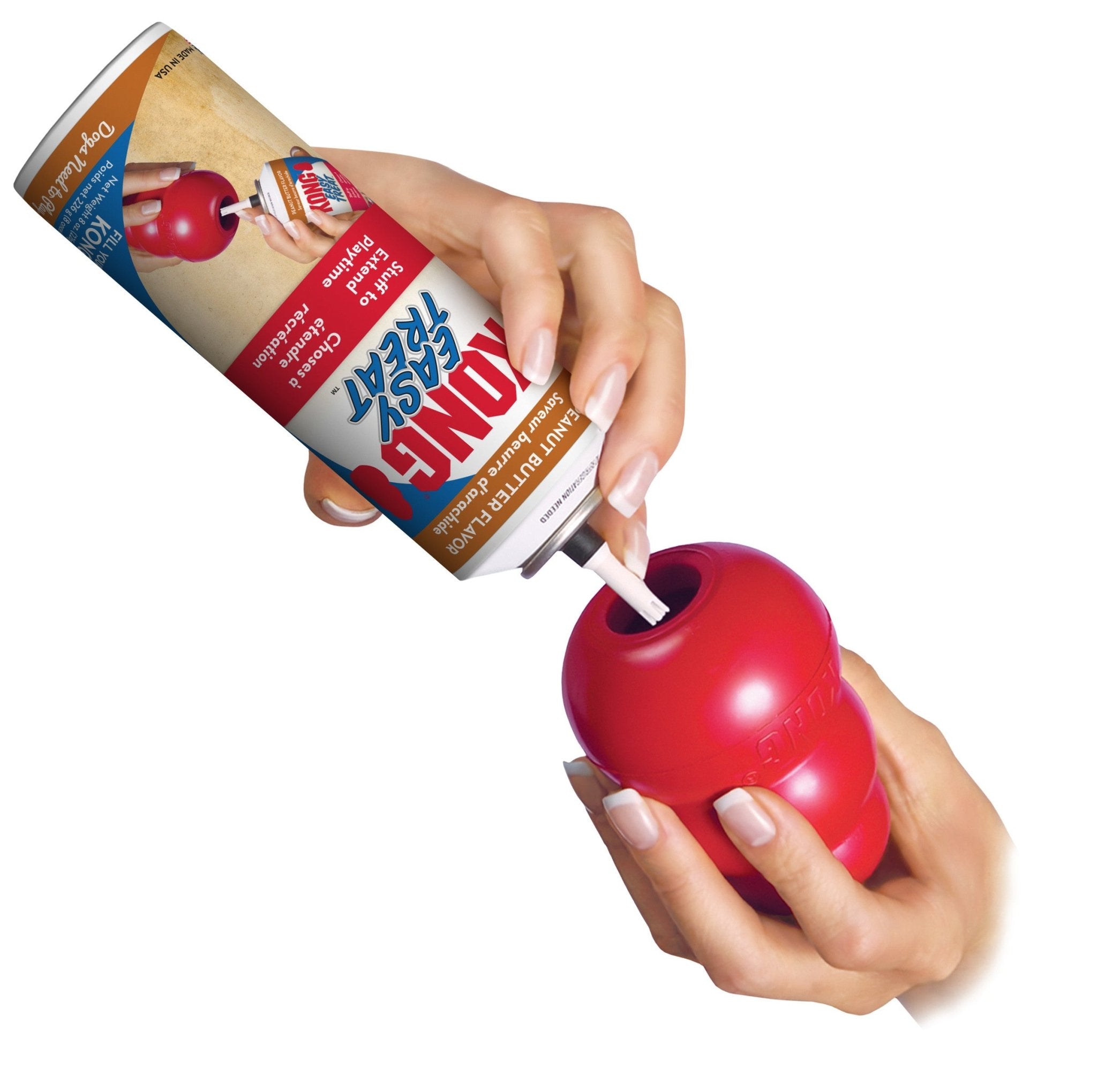 Hand using a can of Bonder to secure a red object together on a white background