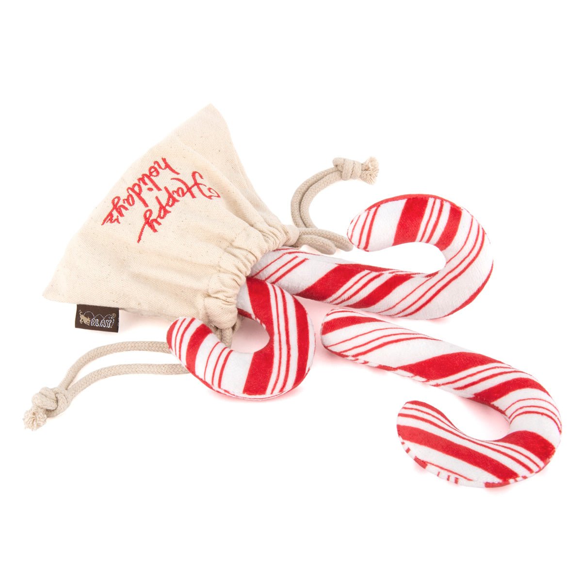 Red and white striped dog toys with a drawstring bag labeled &