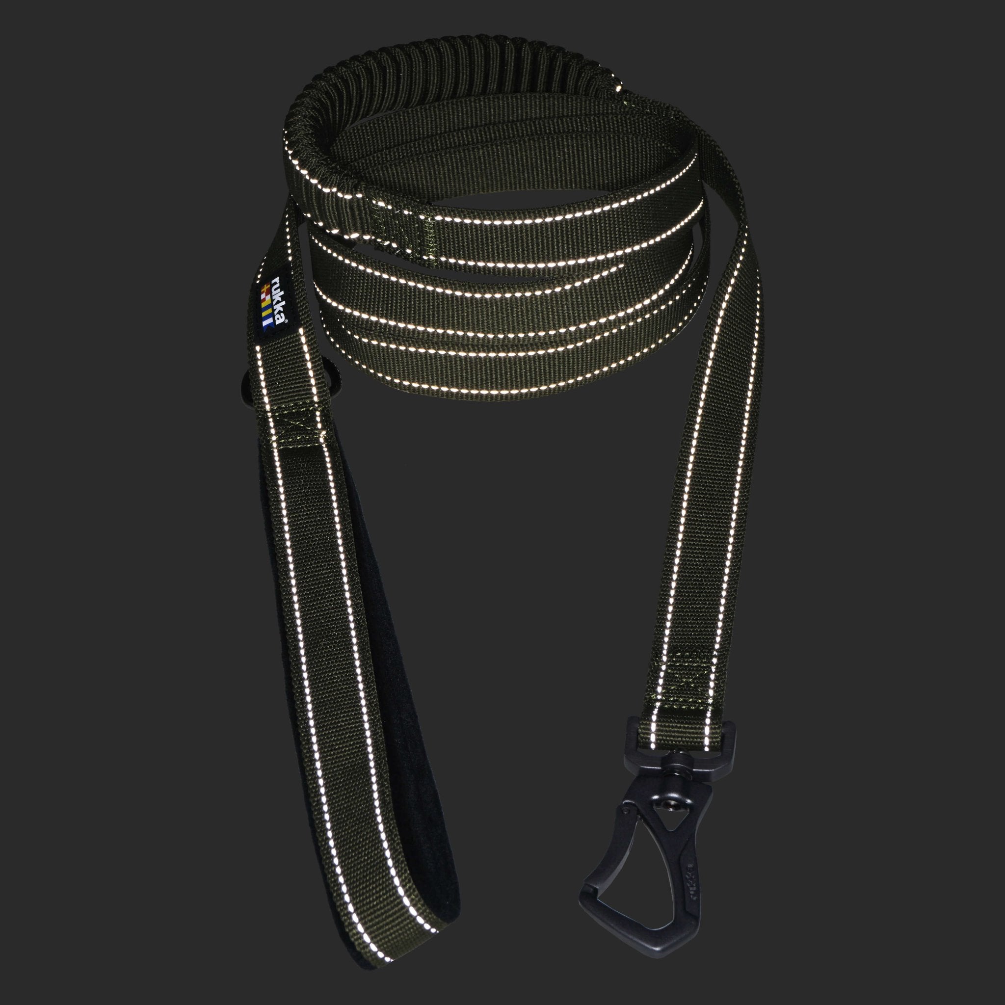 Reflective dog leash with black clip on a dark background