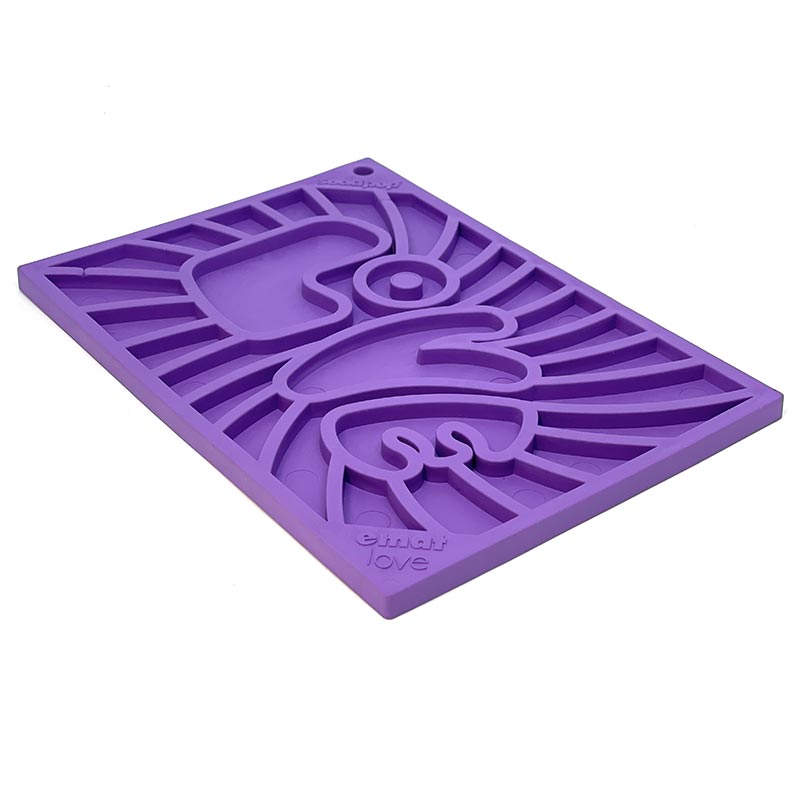 Purple silicone mold with heart design on a white background