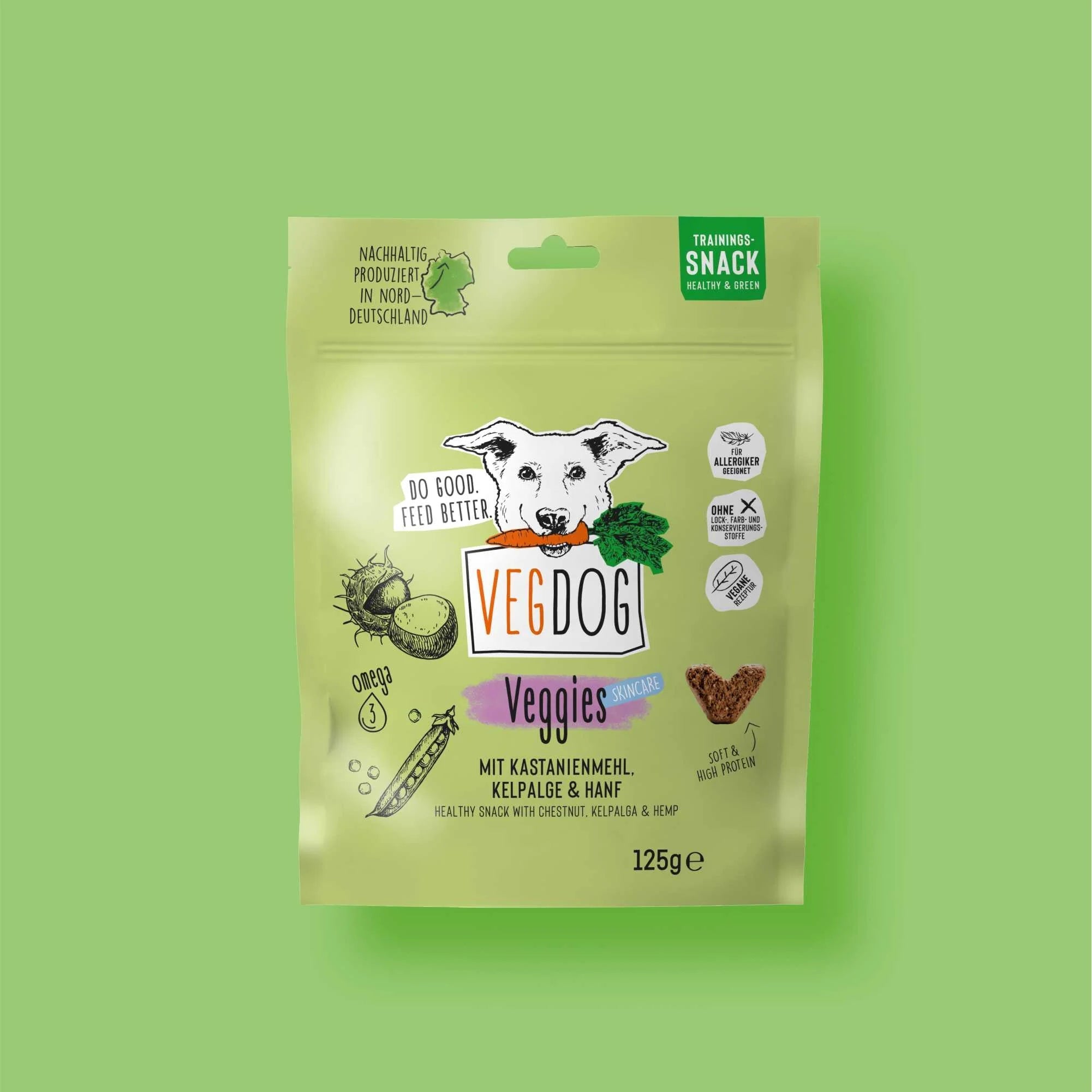 VegDog Veggies snack package on a green background