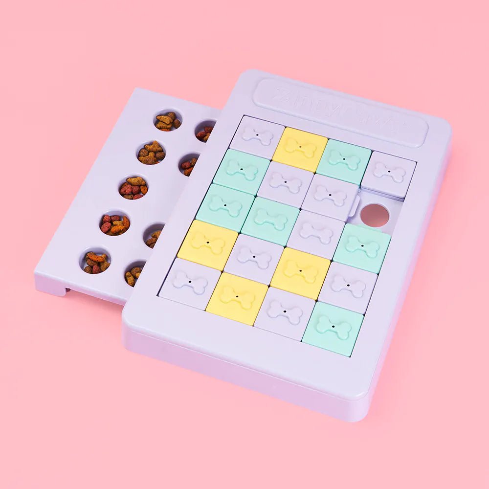 Two silicone mold trays on a pink background