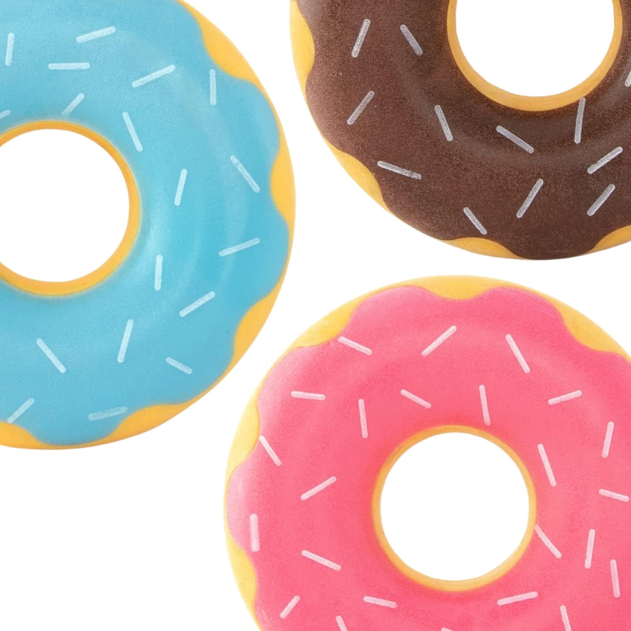 Three colorful donut-shaped pool floats on a white background