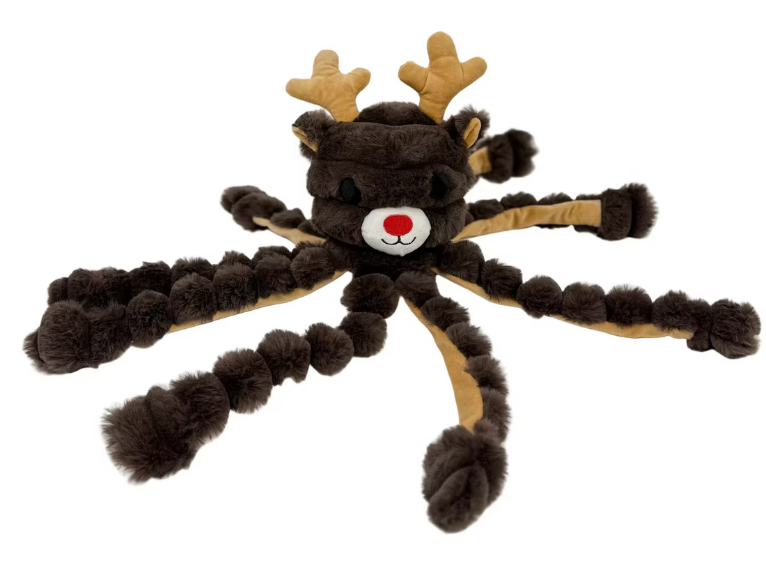 Plush spider toy with reindeer face on a white background
