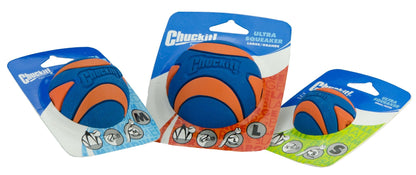 Three Chuckit! Ultra Squeakz dog toys in blue and orange packaging on a white background.