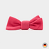 Pink bow tie on a light gray background with a brand logo in the corner.