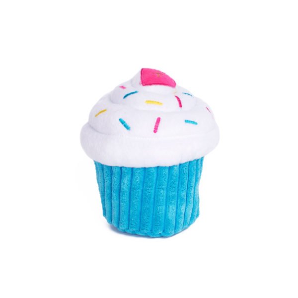 Cupcake-shaped toy with blue casing and white frosting on a white background