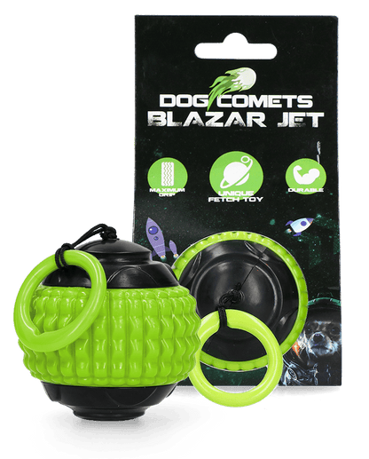 Green and black dog toy with packaging labeled &
