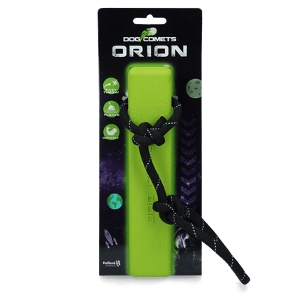 Green dog toy with black handle in packaging labeled &