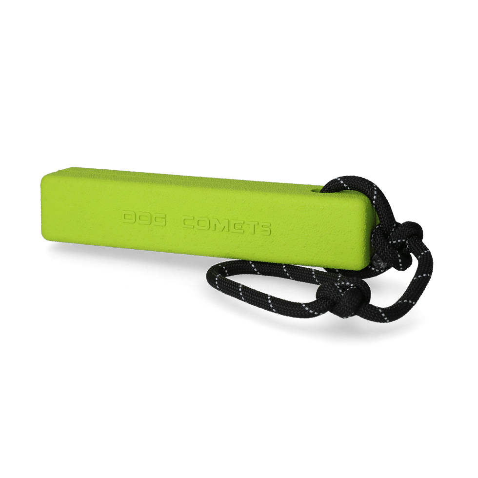 Yellow dog toy with a black leash on a white background