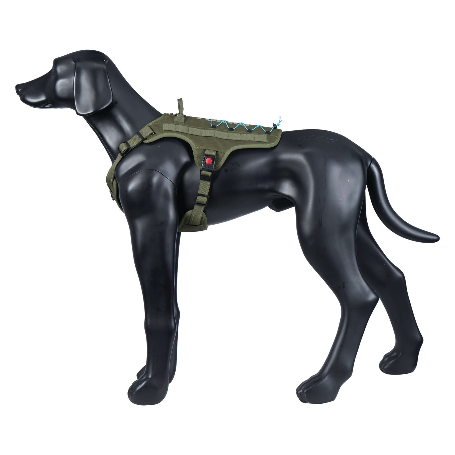 Black dog mannequin wearing a green tactical harness on a white background