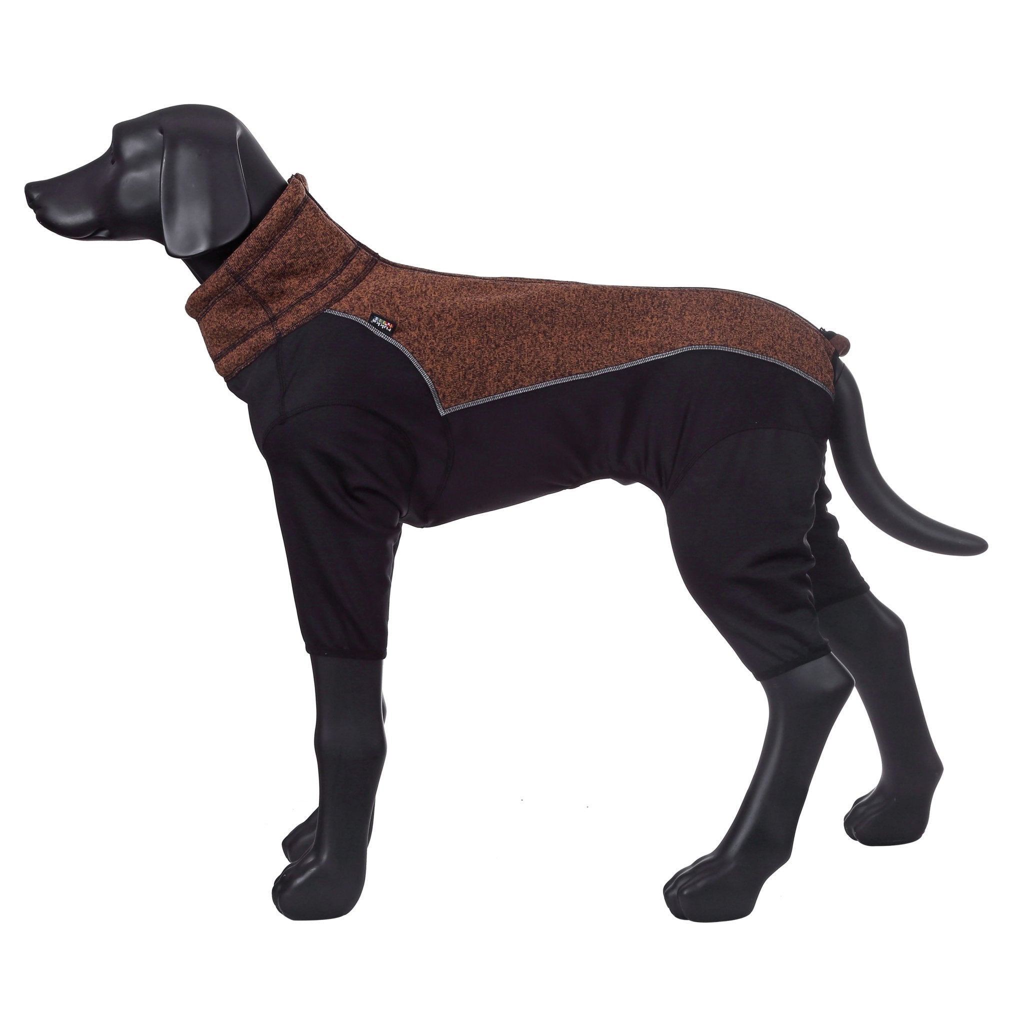 Dog wearing a brown and black fleece coat on a white background