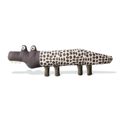 Plush toy alligator with brown body and spotted pattern on a white background