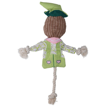 Toy figure of a character with a green hat and coat on a white background