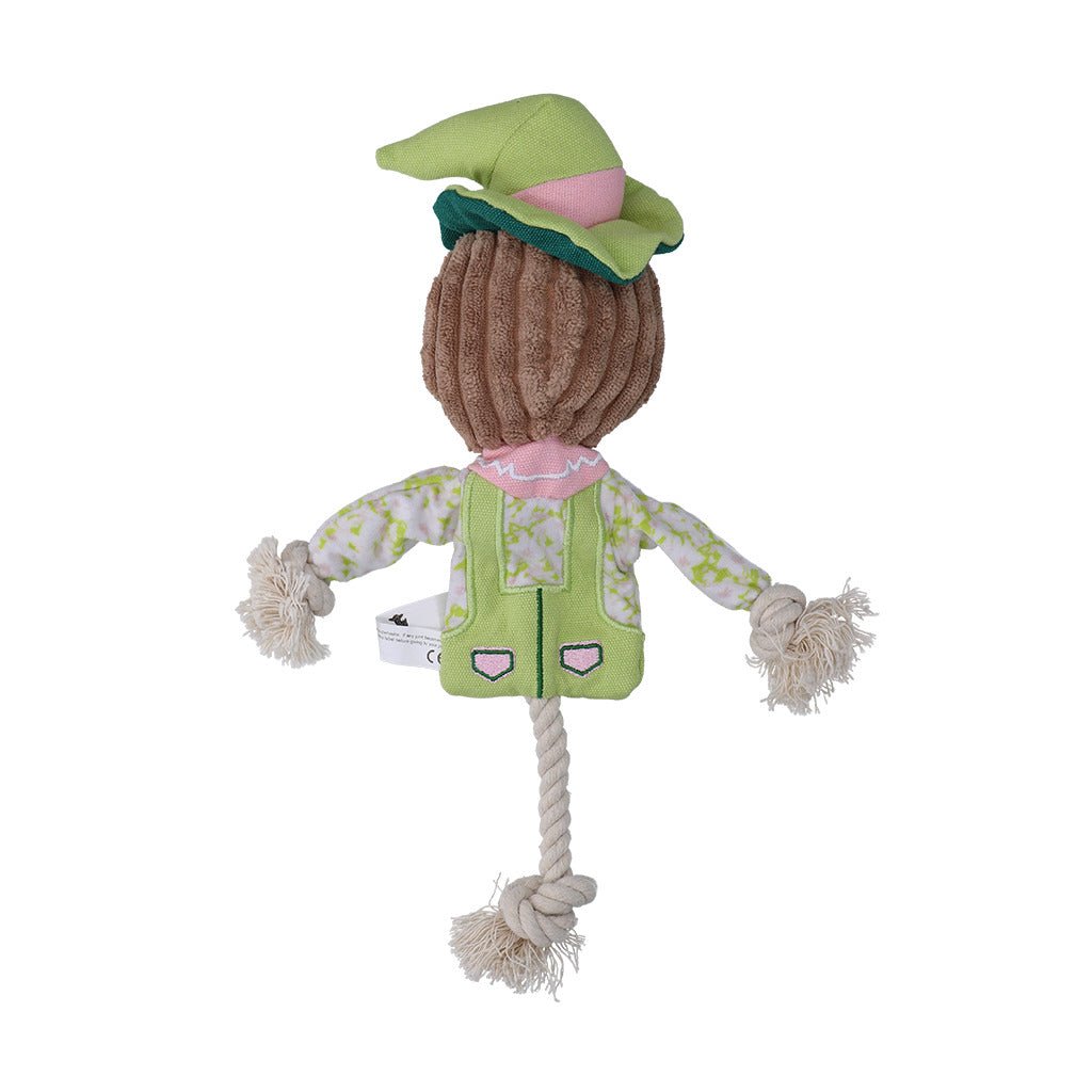 Toy figure with a green outfit and hat on a white background