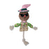 Toy scarecrow with sunglasses and a pink hat on a white background