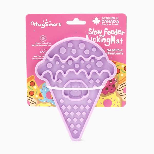 Purple ice cream cone-shaped slow feeder licking mat on a pink packaging with &