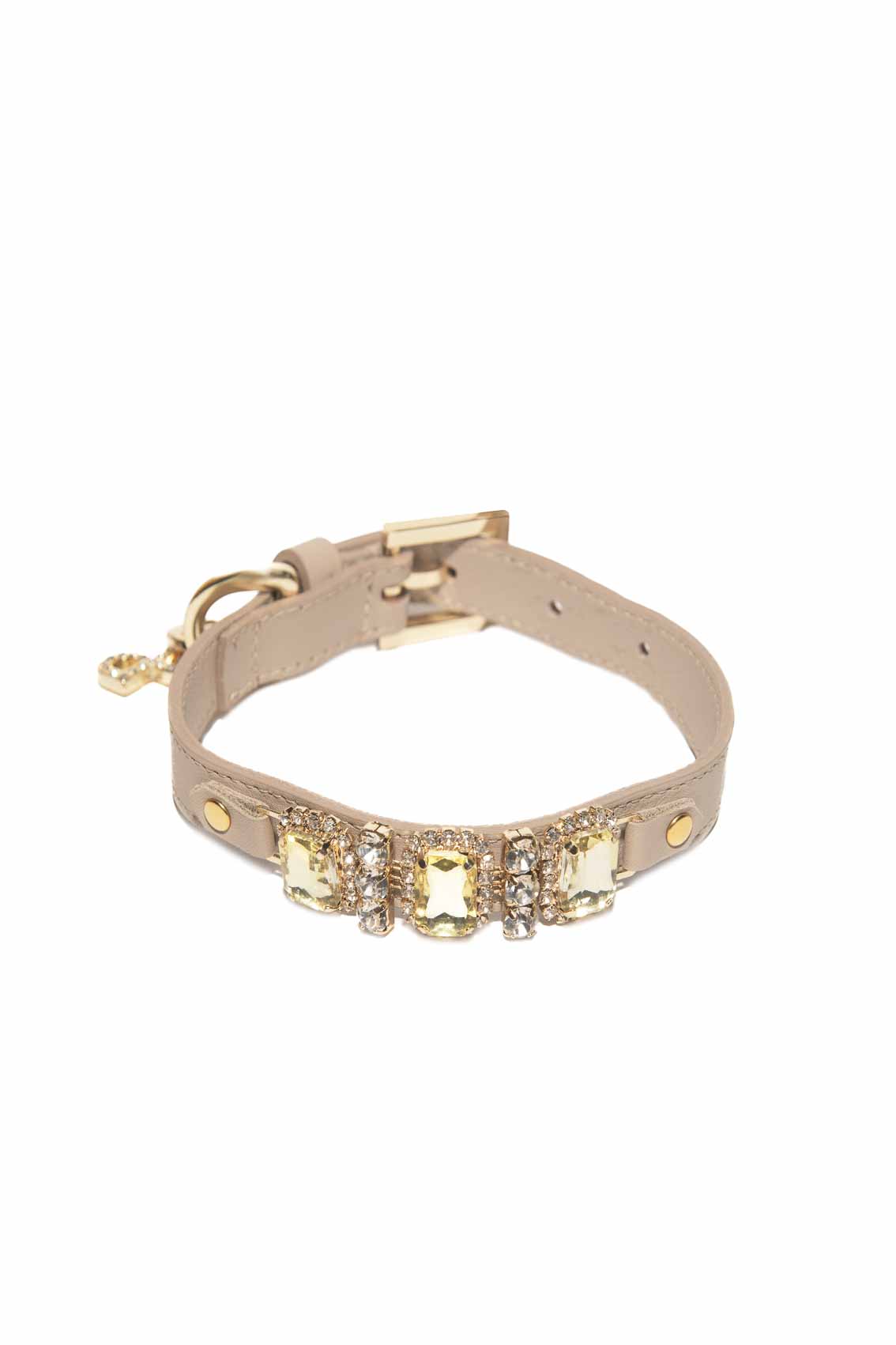 Beige leather bracelet with gold accents on a white background