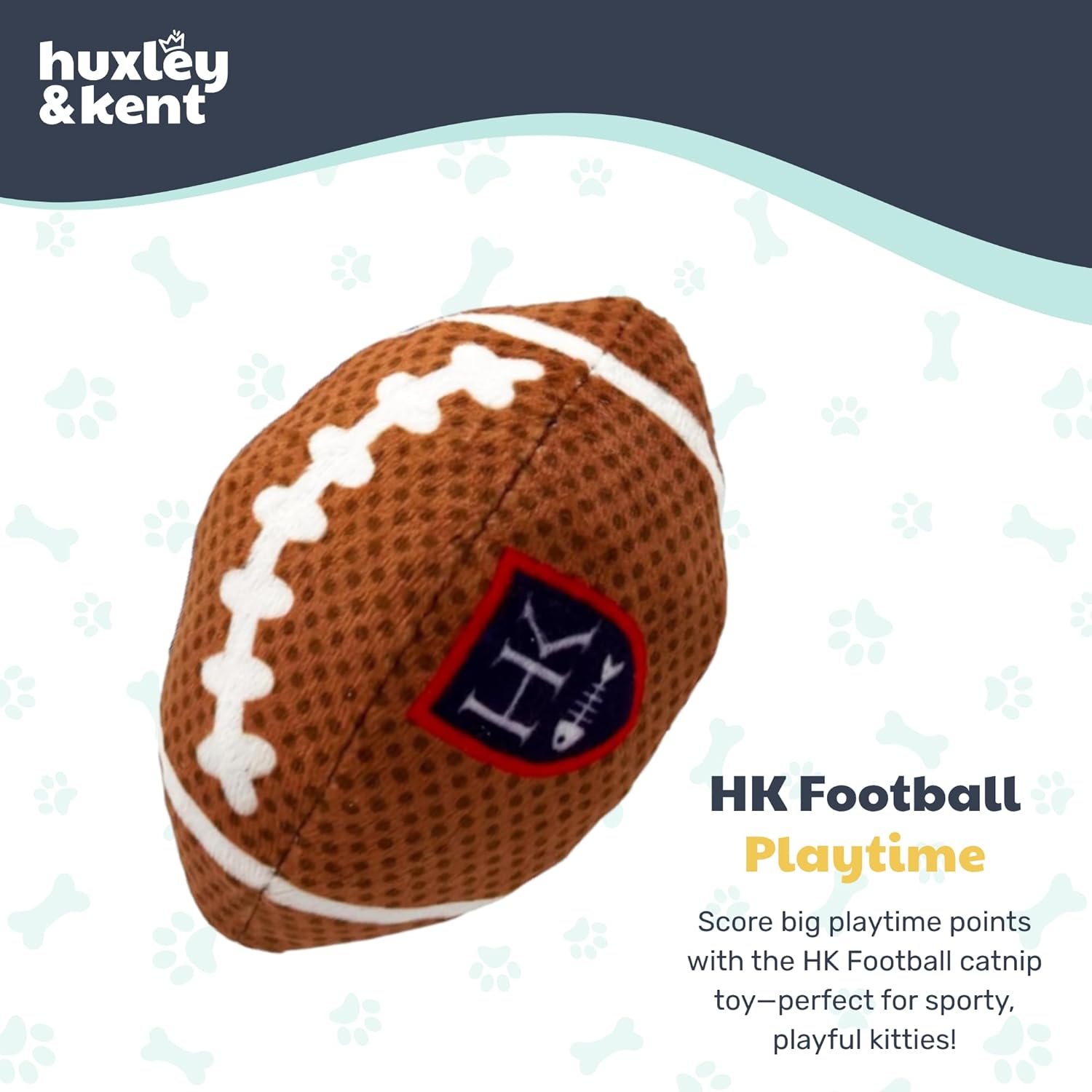 Catnip toy resembling a football with Huxley &amp; Kent branding on a light blue background.