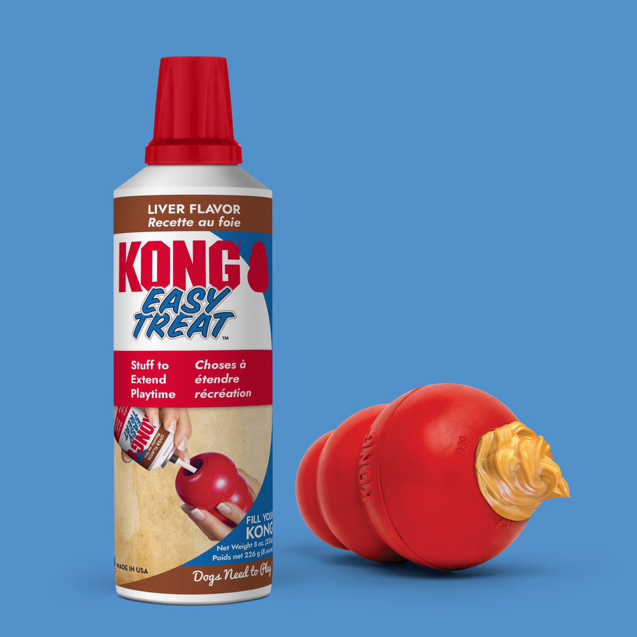 KONG Easy Treat can with a red KONG toy on a blue background