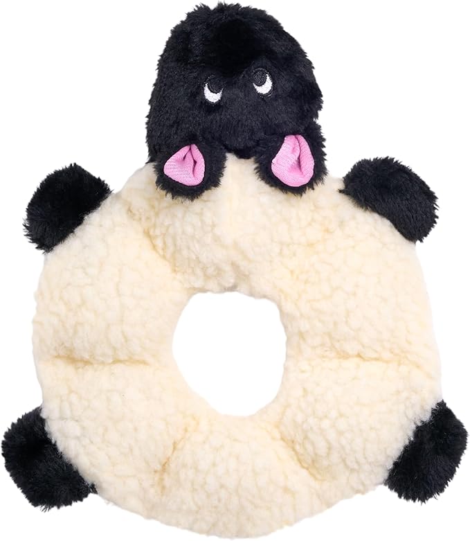 Plush toy shaped like a sheep with black face and pink ears on a white background