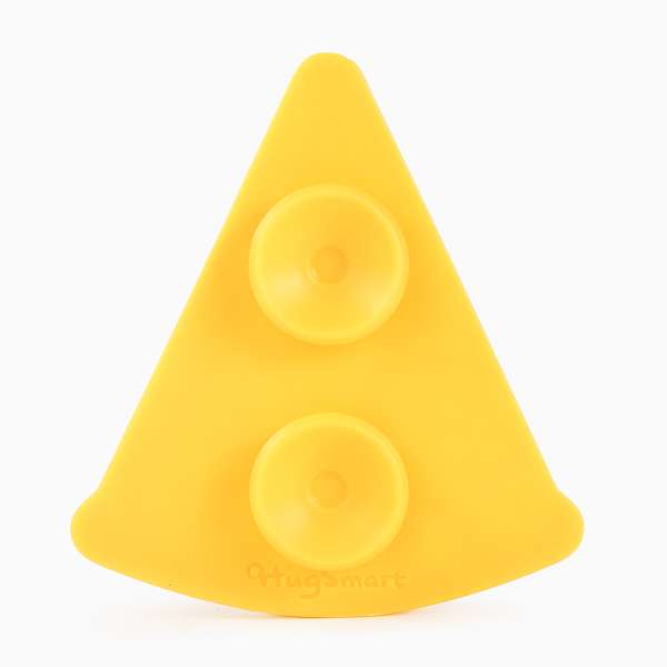 Yellow silicone teether shaped like a cheese wedge on a white background