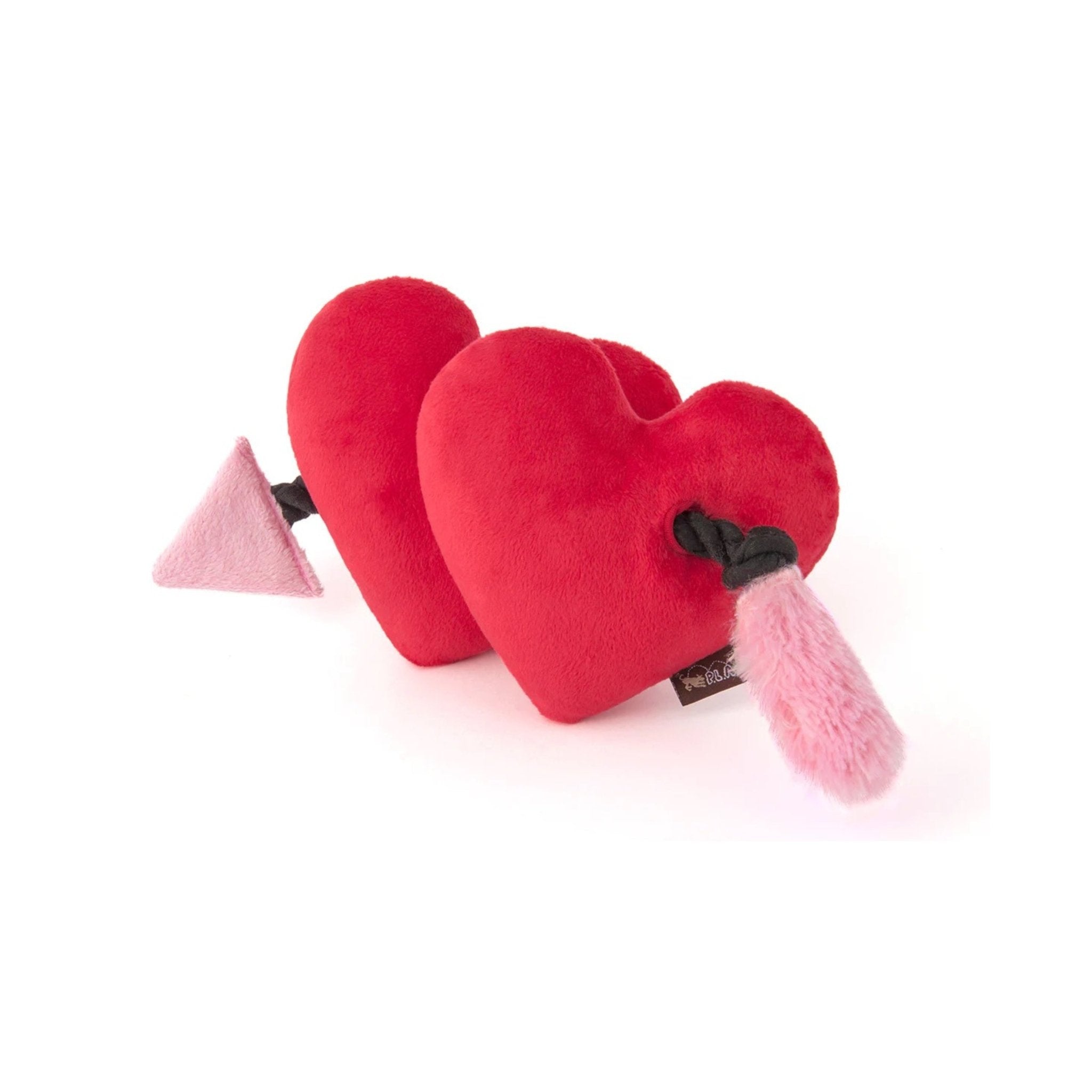 Red heart-shaped plush toy with a pink arrow on a white background