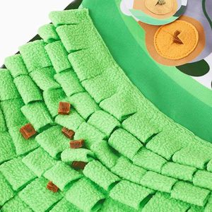 Green textured product with small brown elements on a green background