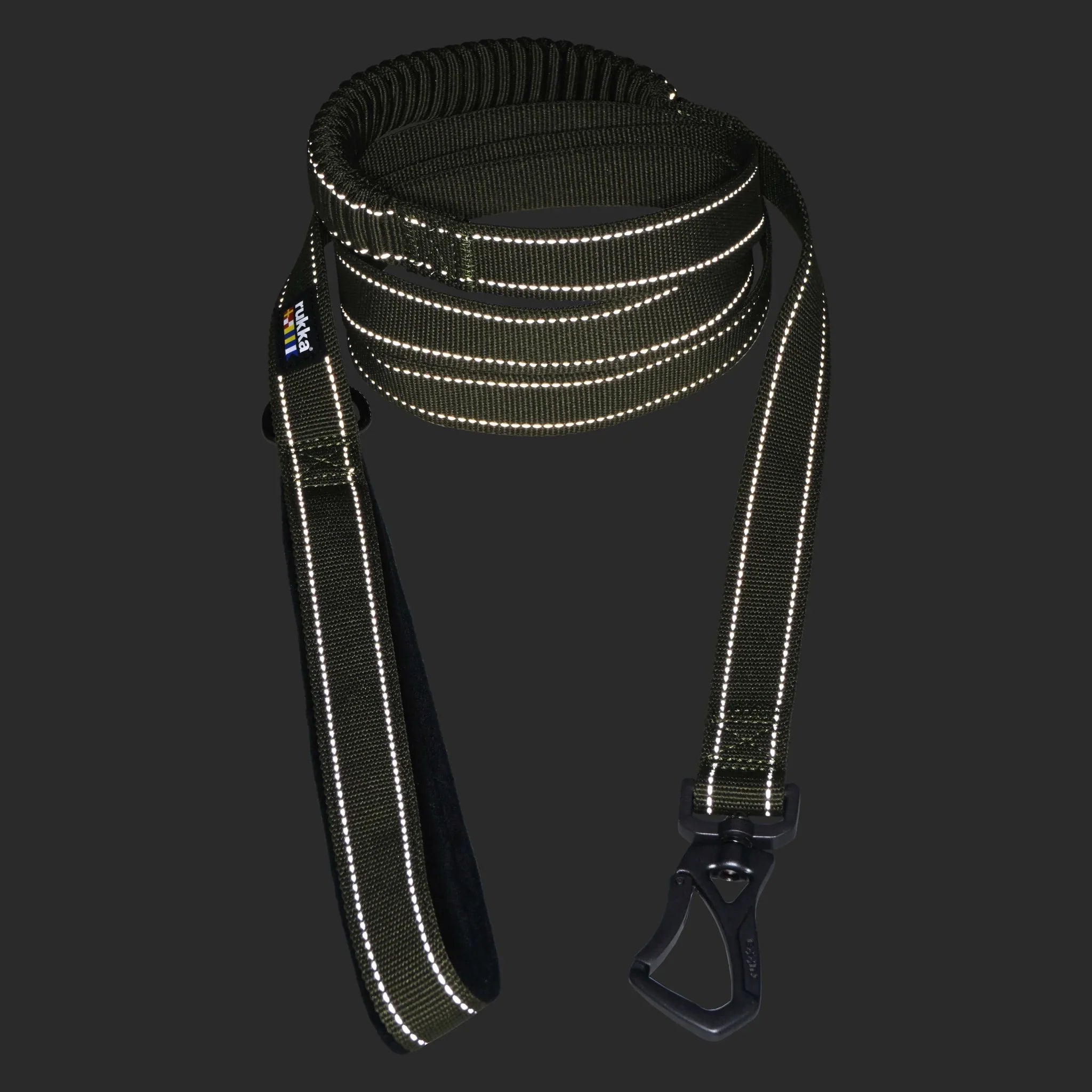Reflective dog leash with black clip on a dark background
