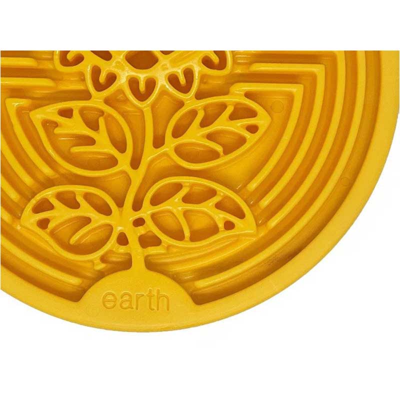 Yellow silicone mat with tree-of-life design and &