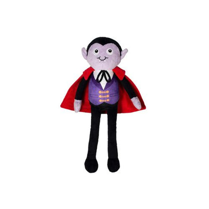 A plush vampire doll with a purple face, black hair, pointed ears, a red cape, a purple vest with gold buttons, a white shirt, and black pants, shown against a plain white background.